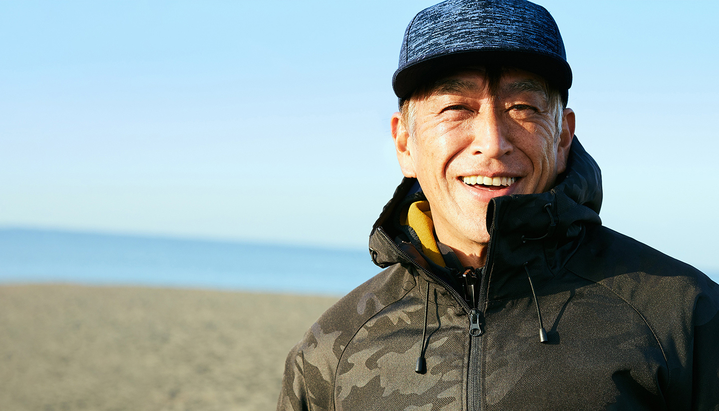 smiliing man on beach